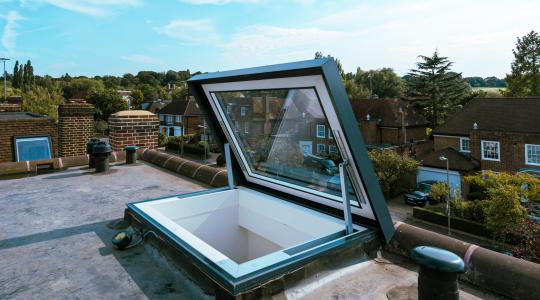 Eletrical access hatch rooflight fully open